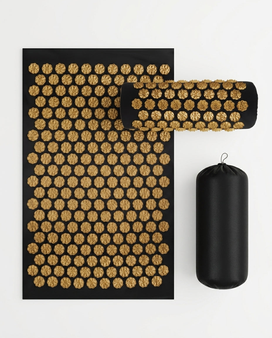 Gold-spike acupressure mat, pillow and carry bag on a white background