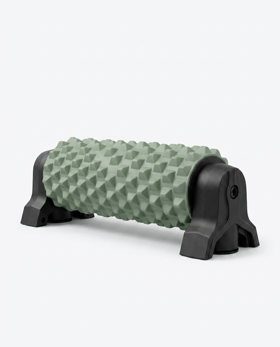 Green textured foam roller on a black wall-mount stand, studio shot on white