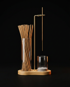 Incense holder set with light oak wood base, studio shot on black background