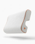 Right orientation couples pillow with orange piping and embroidered R marker