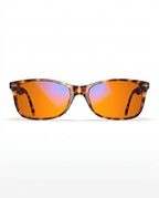 Tortoiseshell blue light glasses with orange lenses, front view on white