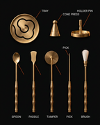 Labeled diagram naming the tray, cone press, tamper, pick and brush tools