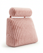 Pink channel-quilted reading wedge headboard pillow with bolster on white