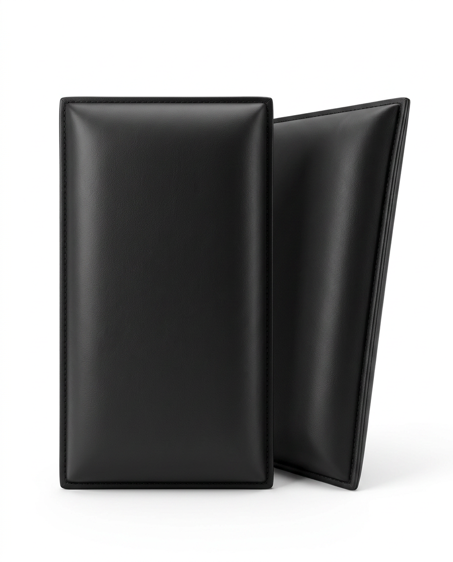 Two black upholstered wall panels standing on a white background