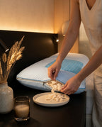 Woman unzipping the pillow to remove foam and adjust its loft at night