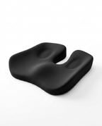 Black contoured memory foam seat cushion, three-quarter studio view on white