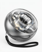 Premium all-metal gyro ball trainer with polished steel housing on white