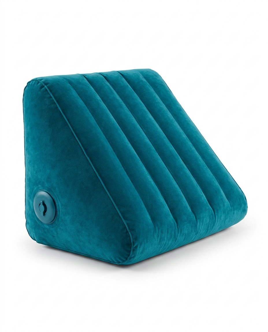Peacock teal inflatable wedge support pillow on a white background