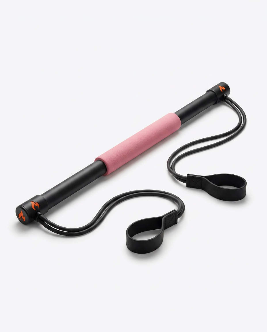 Pink-grip Pilates bar kit laid flat with bands and foot loops