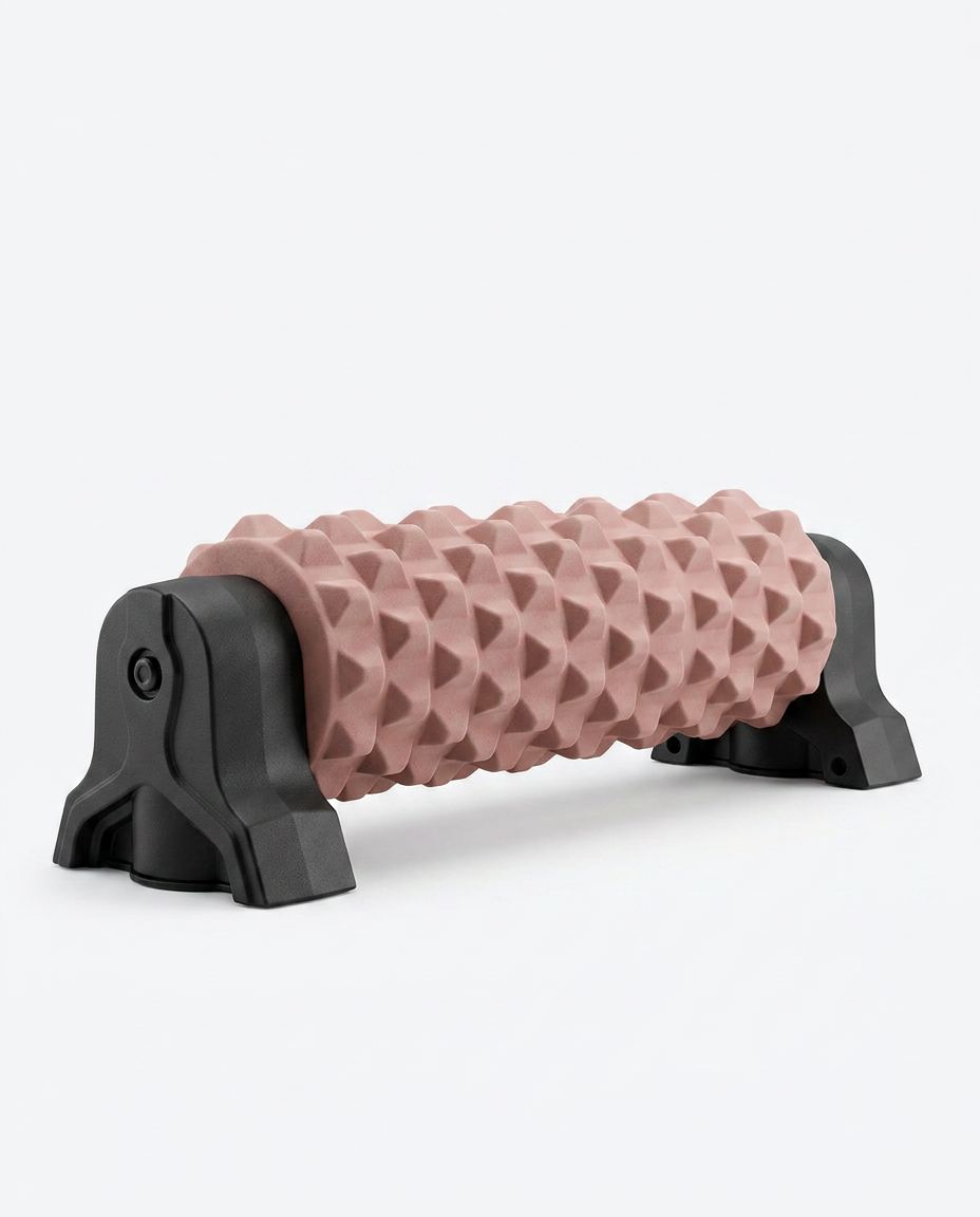Pink textured foam roller on a black wall-mount stand, studio shot on white