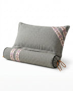 Premium gray linen support cushion and bolster with embroidered trim on white