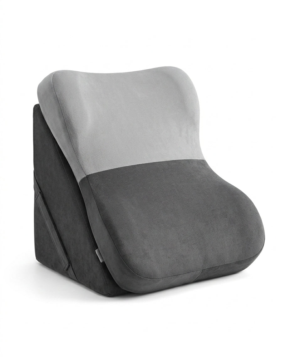 Two-tone gray wedge lounger, light gray headrest over charcoal seat, on white