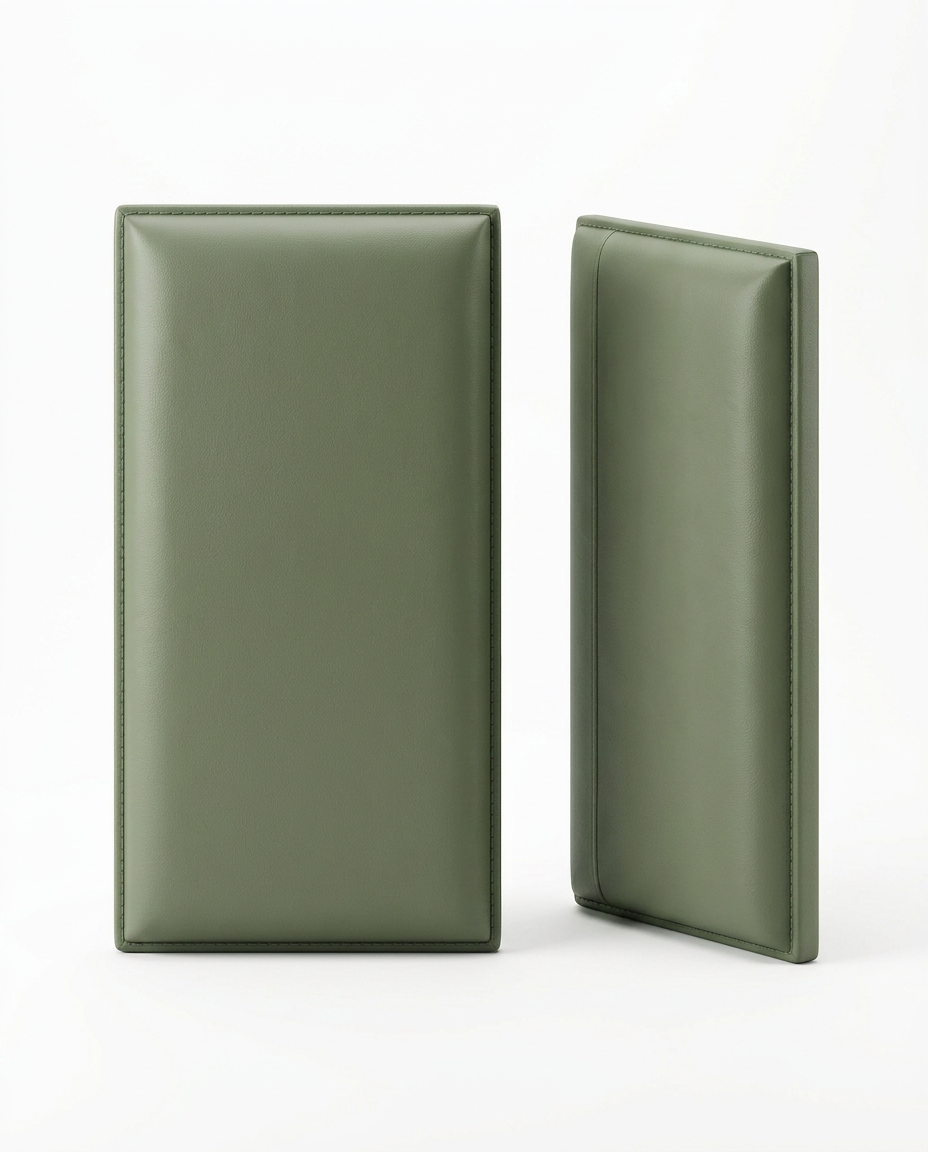 Two olive green upholstered wall panels standing on a white background