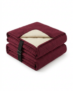 Folded wine red quilted recliner cover showing cream non-slip underside
