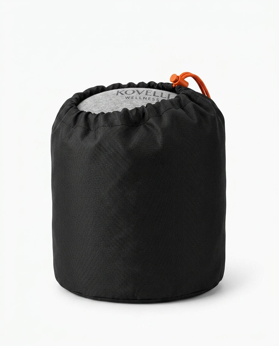 Travel neck pillow packed into a compact black drawstring carry bag