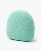 Mint green no-finger palm cradle hand cushion on a white background