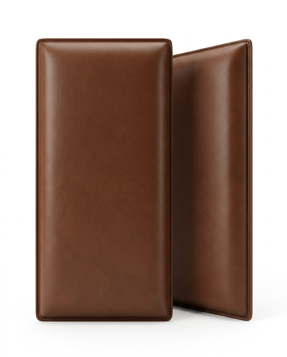 Two brown upholstered wall panels standing on a white background