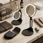 Two LED mirrors and a folded one on a marble counter with 30X magnifier attachment