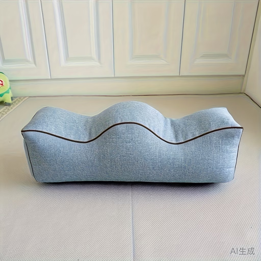 Light blue-gray leg elevation pillow with contoured channels, angled view