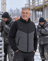 Beheizbare Herrenweste PyreFit Sherpor im Winteralltag: Auf der Baustelle